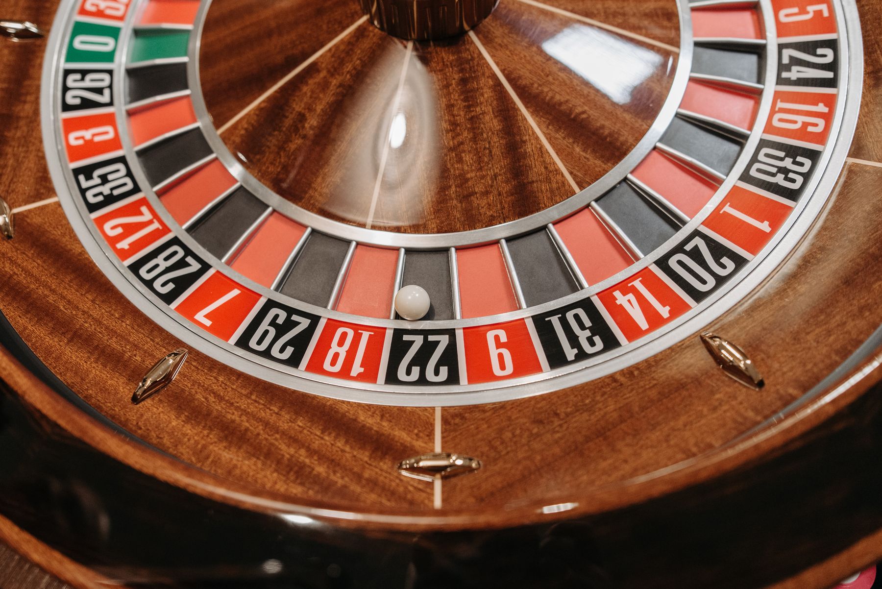 European roulette wheel and blue felt at Clarity Casino De Meern